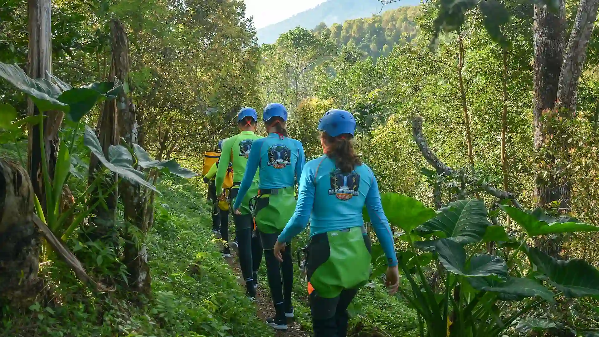 A guided group making its way through a North Bali canyon