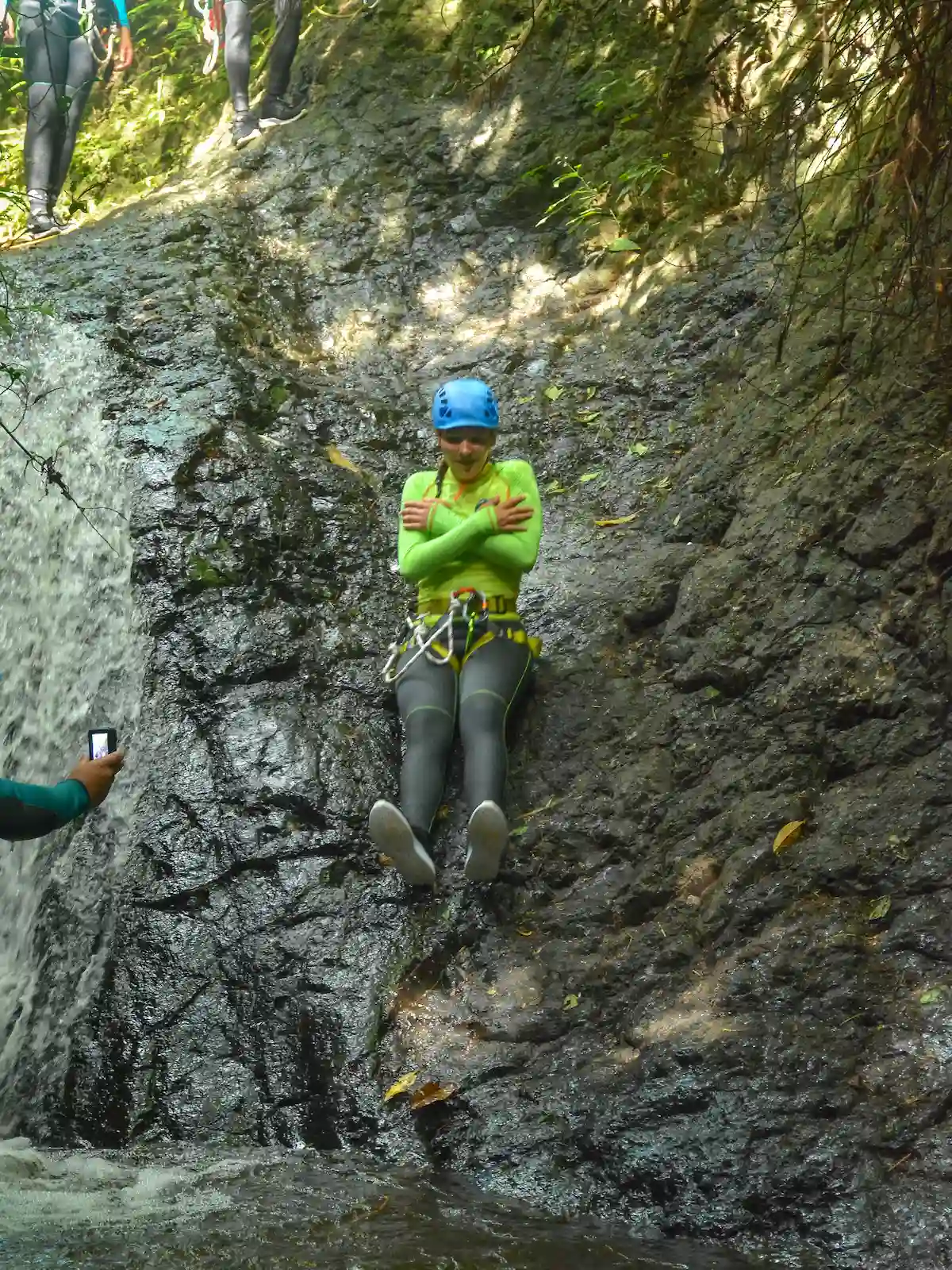 Sliding down a smooth natural rock slide