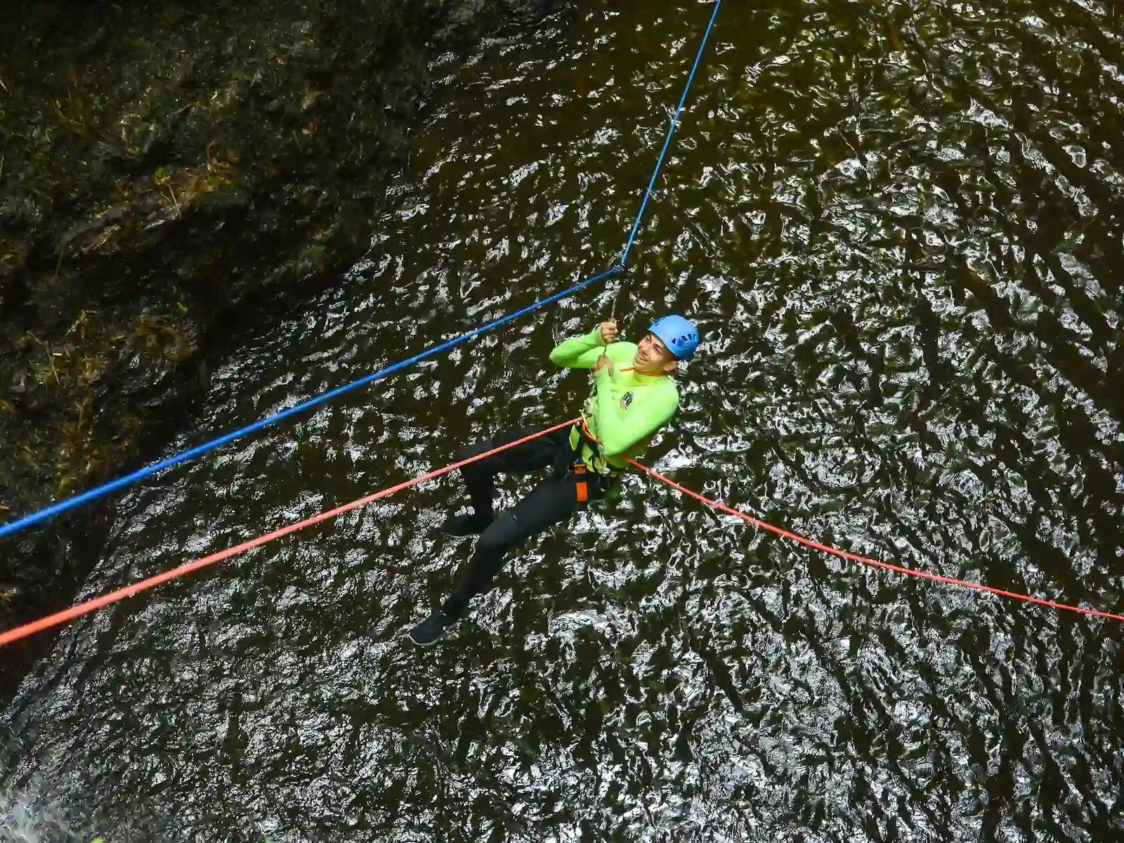 Rope systems and safety equipment on a canyon traverse in North Bali