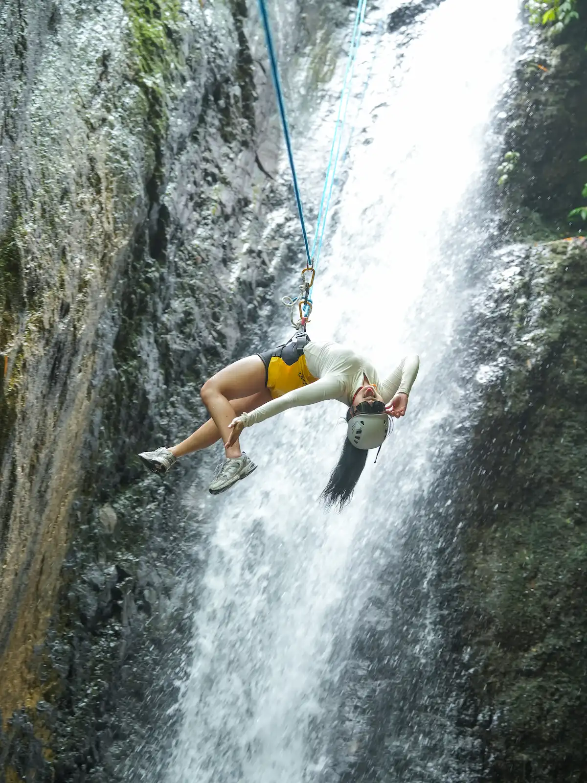 Rappelling at Gitgit Hidden Waterfall, roughly 24 metres high